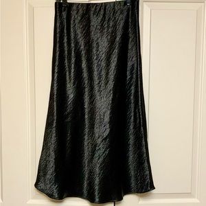 “SO” Shimmering Black Skirt, Size Medium.